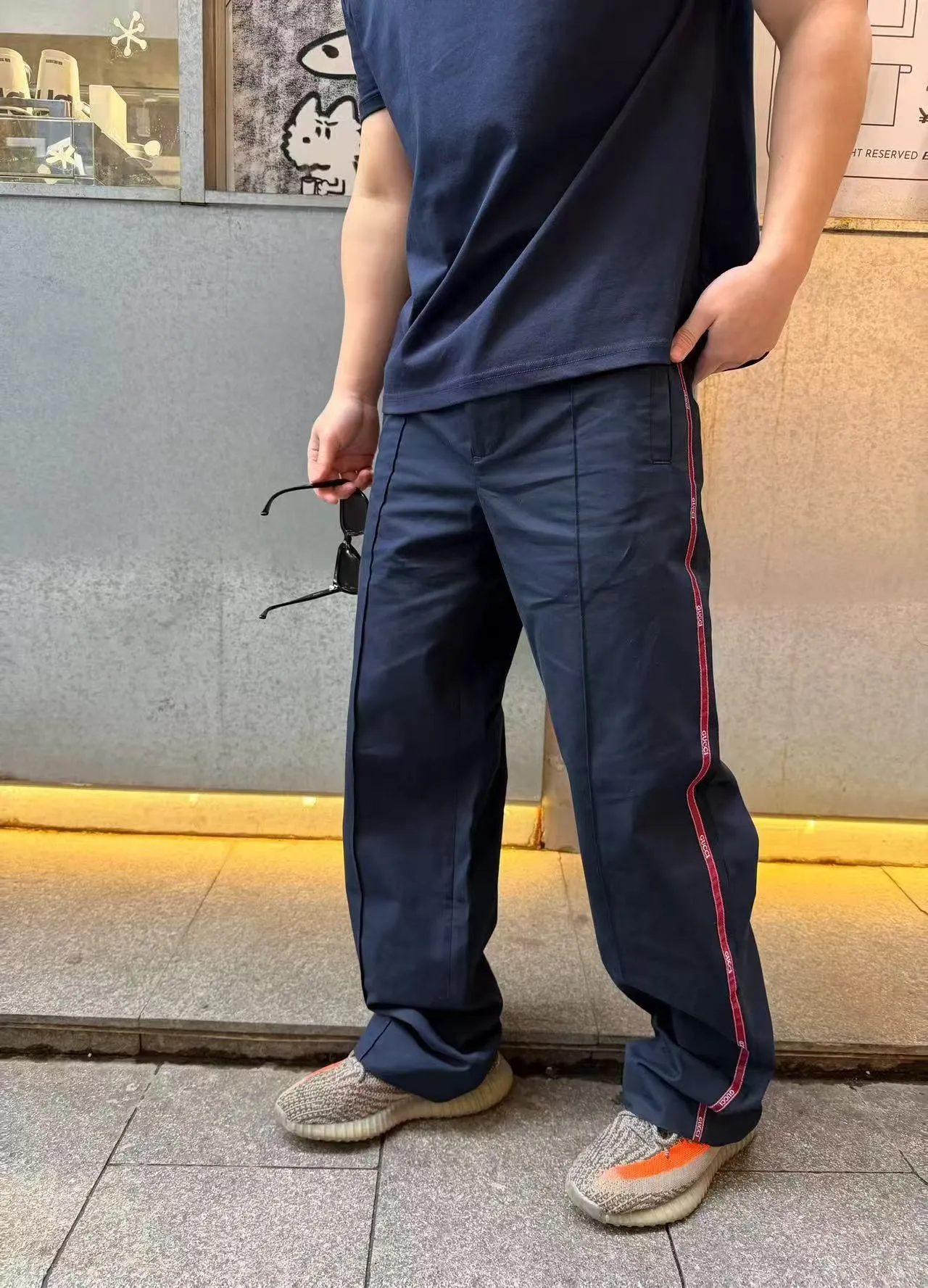 Gucci/Gucci side red stripe web trim sports trousers