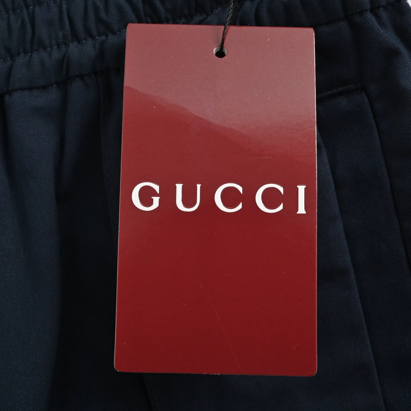 Gucci/Gucci side red stripe web trim sports trousers