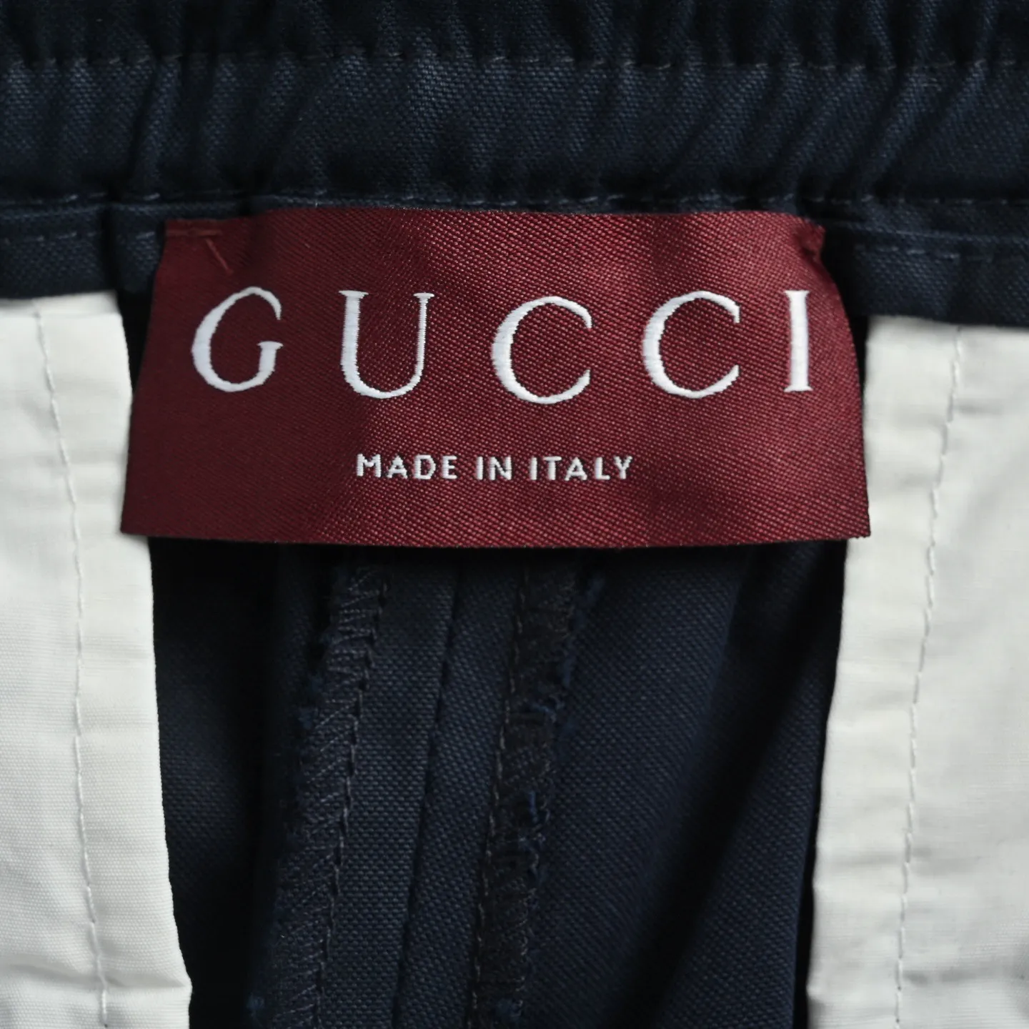 Gucci/Gucci side red stripe web trim sports trousers