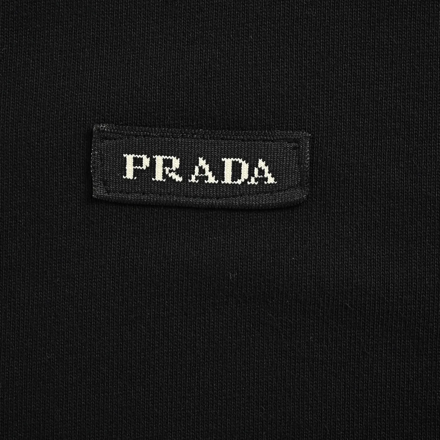 Prada/ T