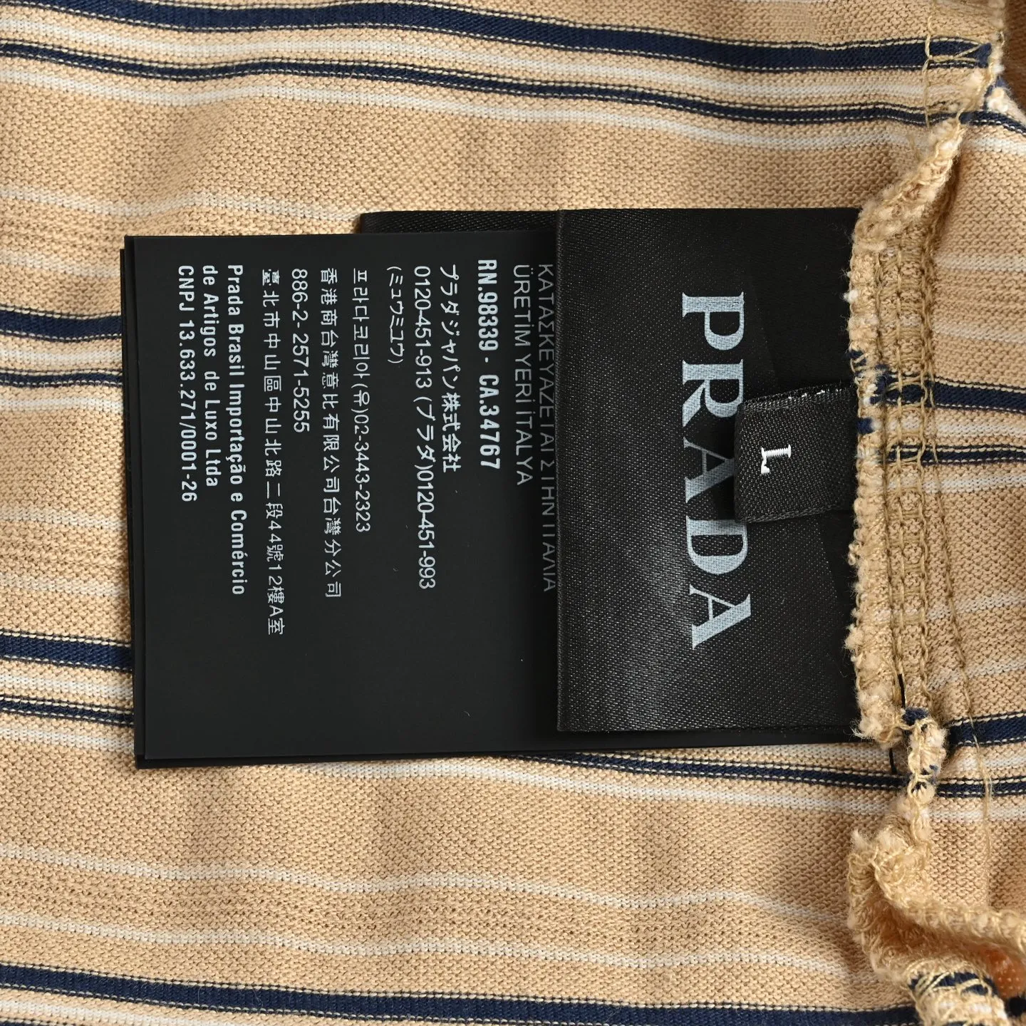 Prada/ POLO