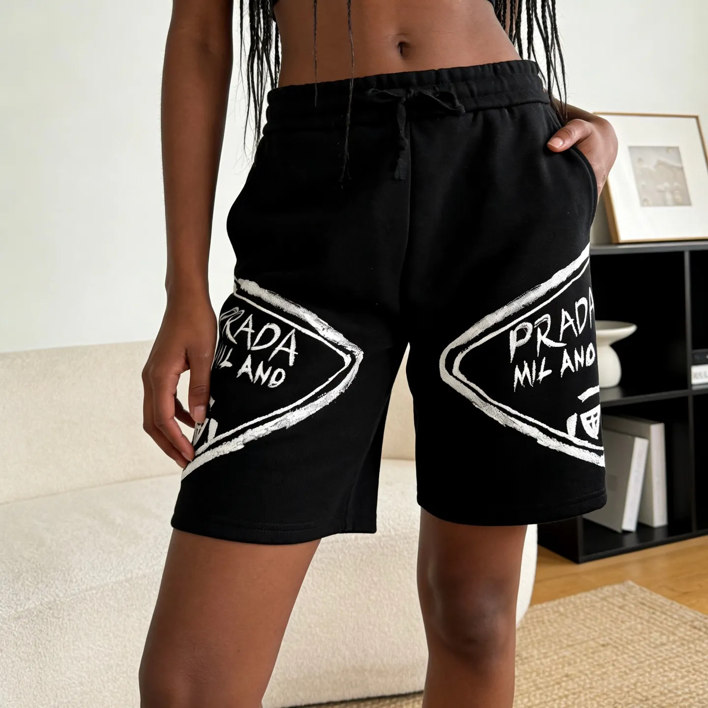 Prada/ logo