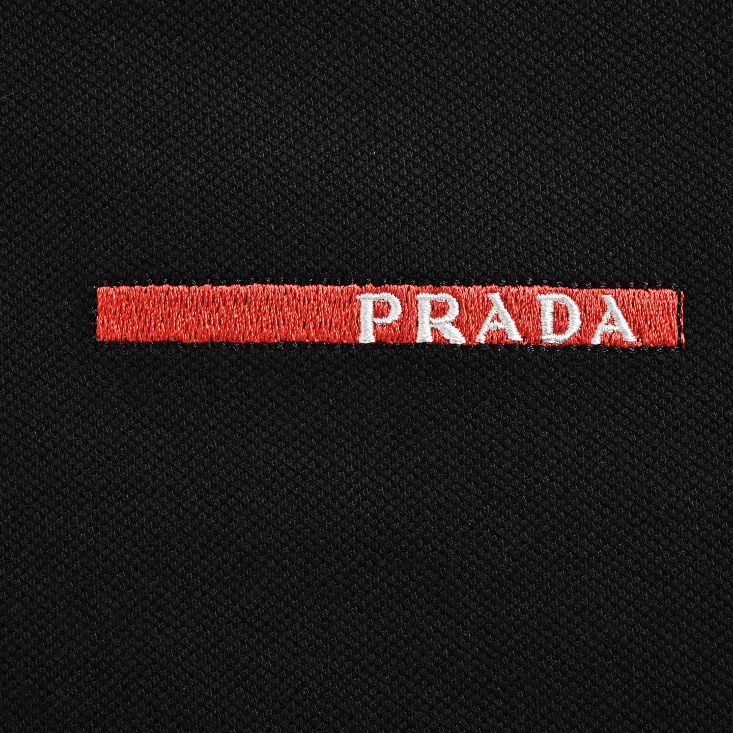 Prada/ Red Polo