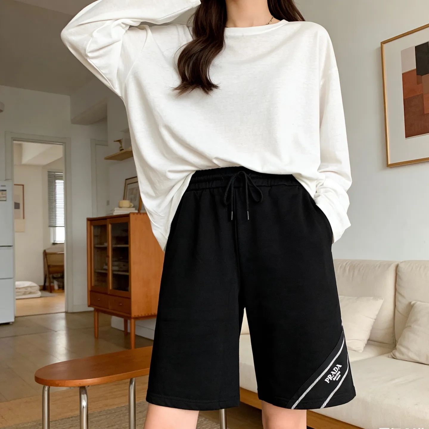 Prada/ logo