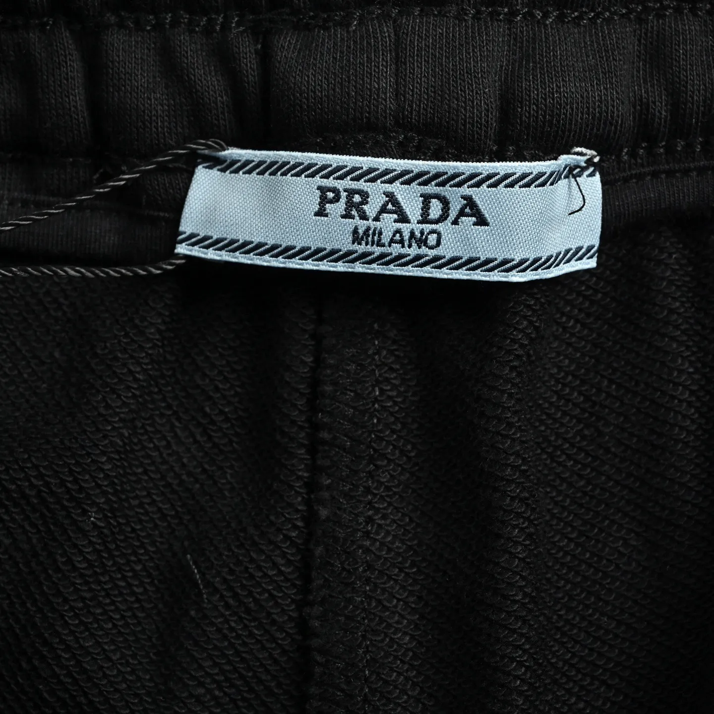 Prada/ logo