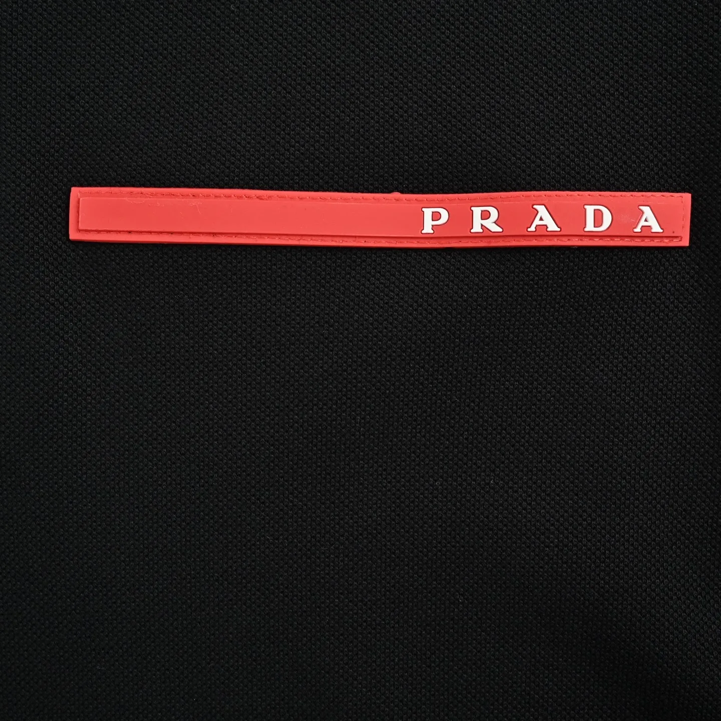 Prada/ Polo