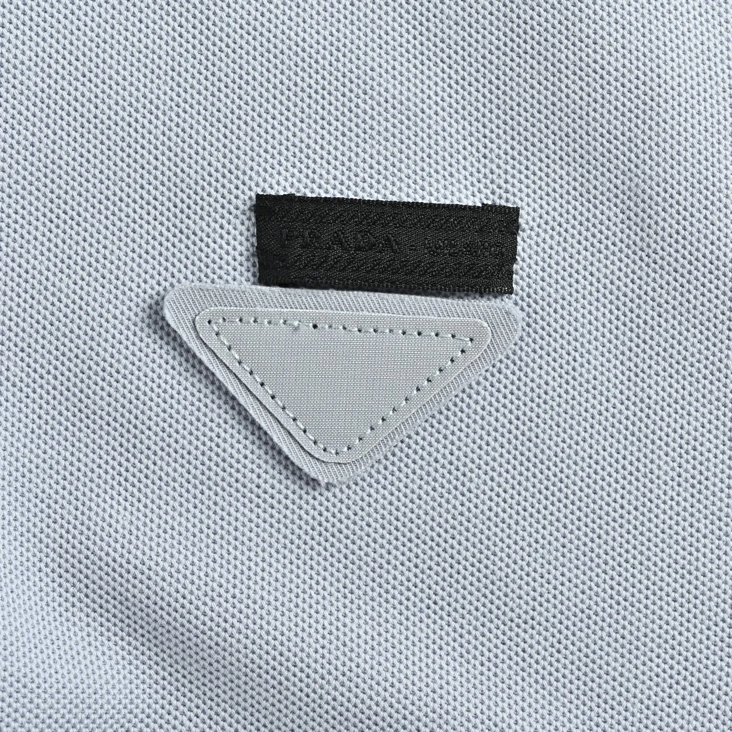 Prada/ Polo