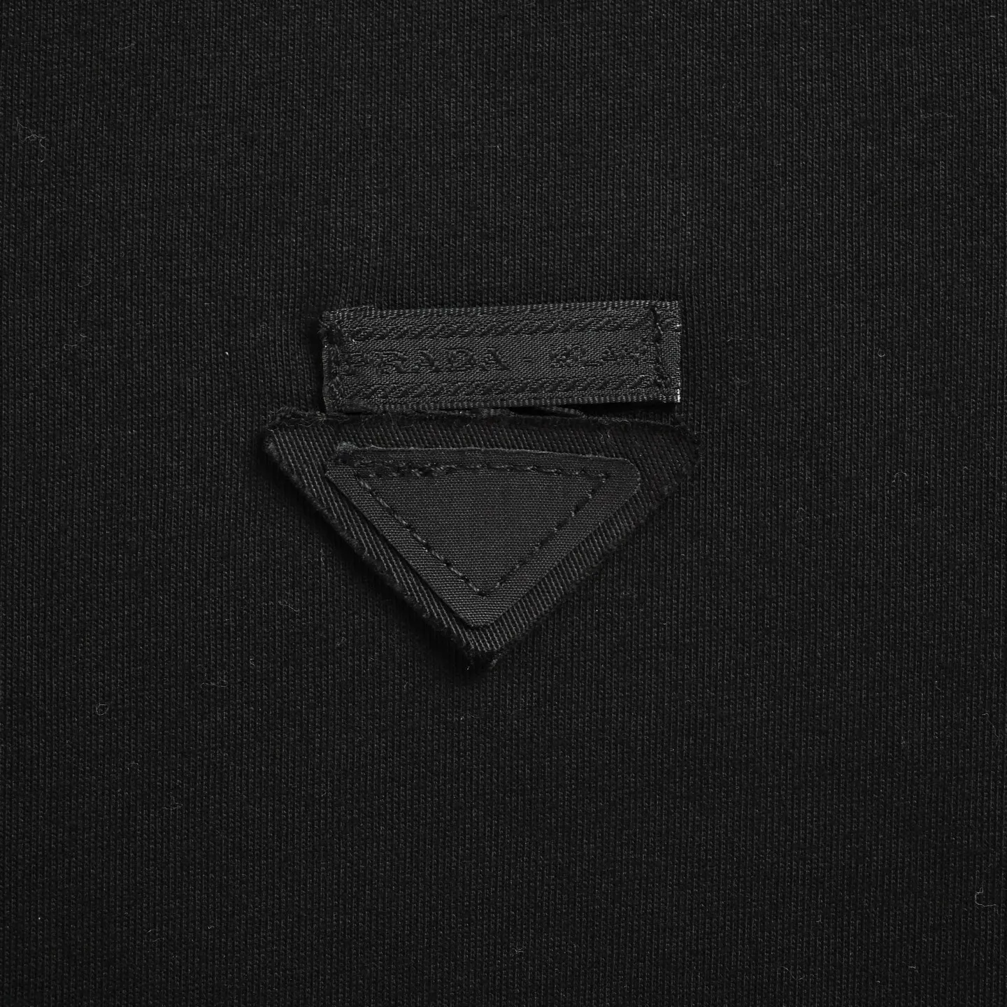 Prada/ T