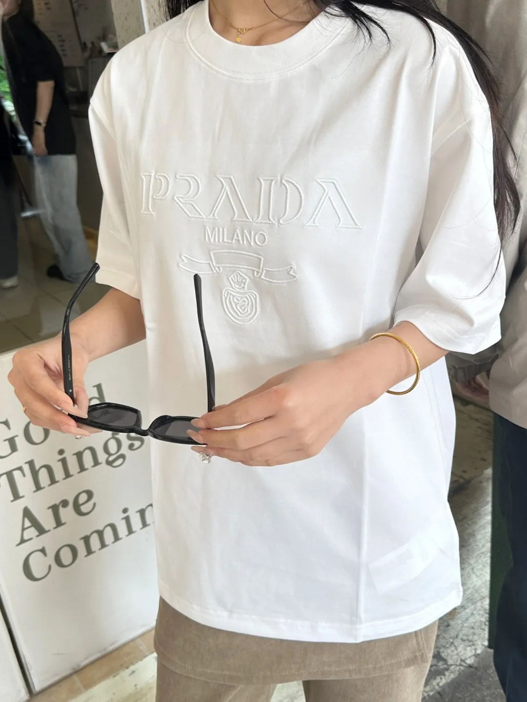 Prada/ logo