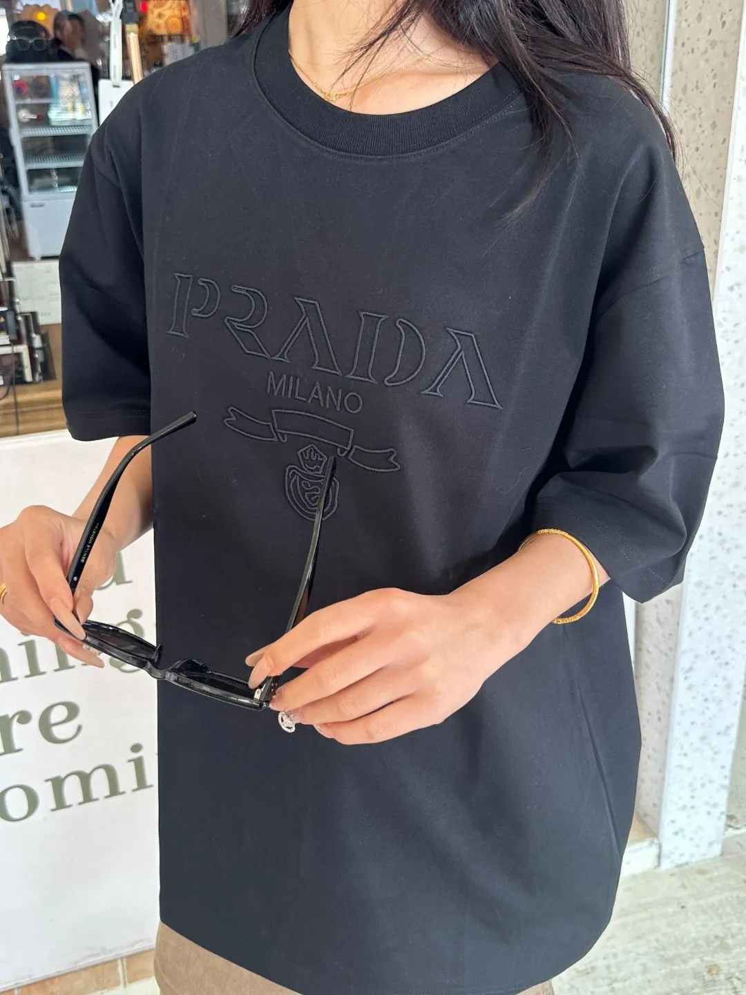 Prada/ logo