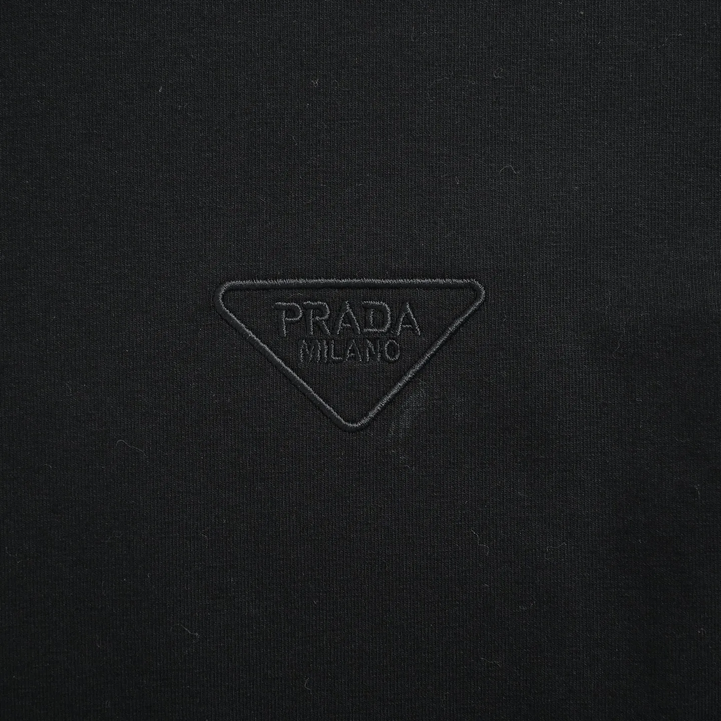 Prada/ T