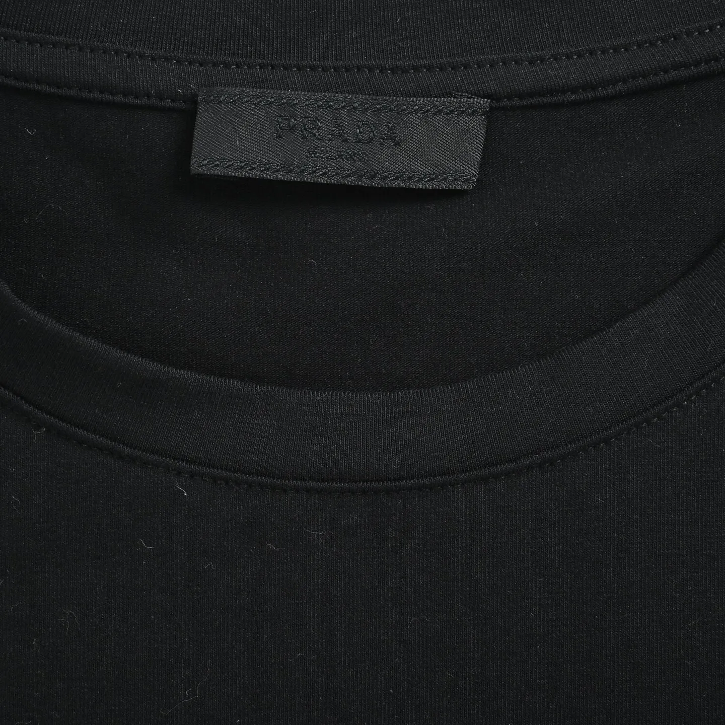 Prada/ T