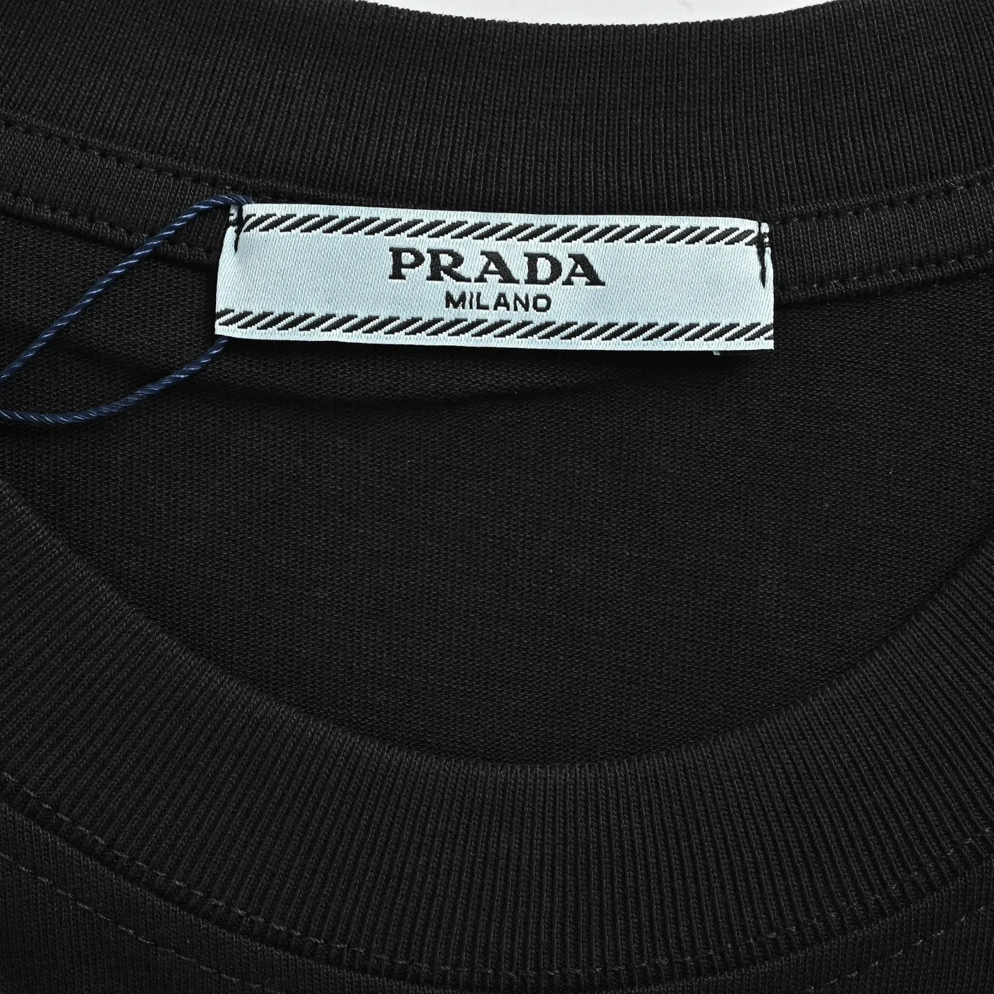 Prada/ logo