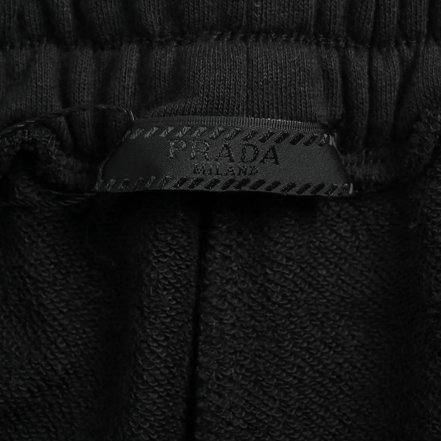 Prada/ logo