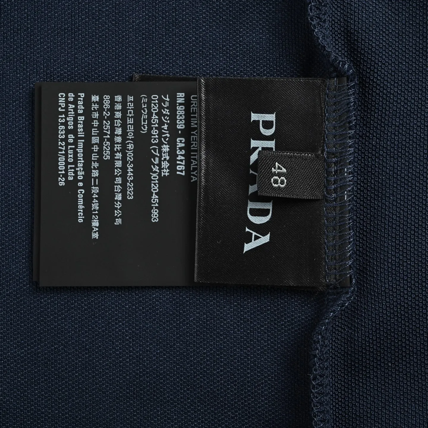 Prada/ Polo